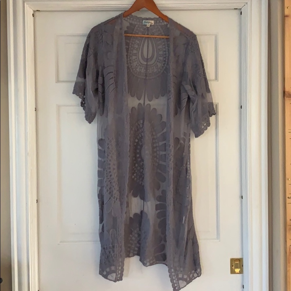 Super cute beach cover up! New without tags. M.